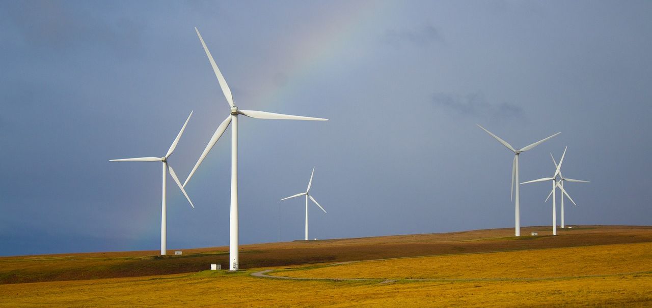 Symbolic Picture wind turbines rainbow